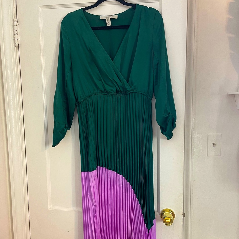 Green and pink block color dress with with pleated skirt.